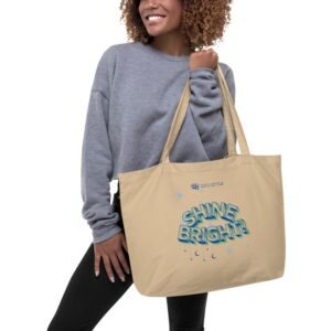 Organic cotton tote carrying groceries at a market/有機棉手提袋裝滿雜貨在市場使用