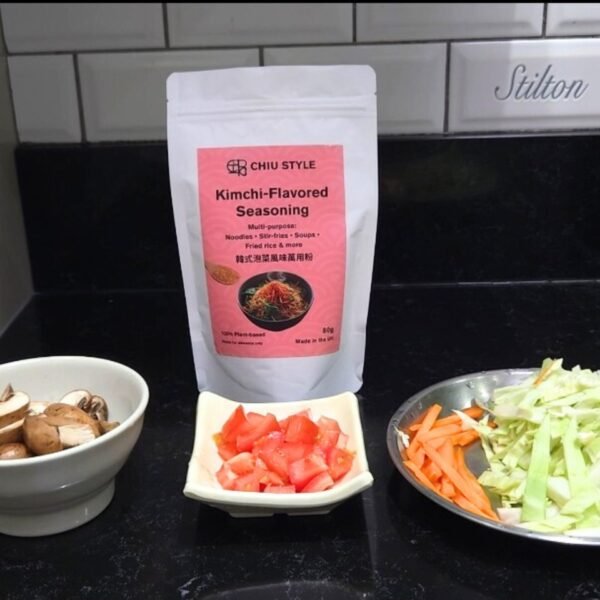 Kimchi-Flavored Seasoning pouch with mushrooms, carrots, and cabbage, ingredients for Korean-style stir-fried pasta