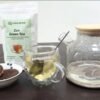 Glass of CHIU STYLE Zen Green Tea with 40g stand-up packaging and chocolate cookies