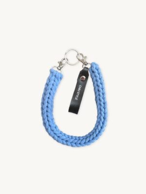Front view of the CHIU STYLE Classic Logo Vegan Leather Braided Keychain in vibrant Cornflower Blue with embossed tag.
