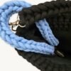 Close-up of the CHIU STYLE Cornflower Blue braided keychain looped through a bag handle for interior organization.