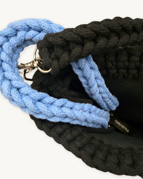Close-up of the CHIU STYLE Cornflower Blue braided keychain looped through a bag handle for interior organization.
