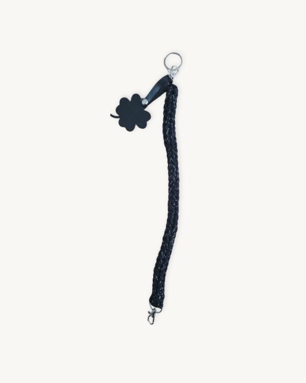Full length straight view of the 36-38cm CHIU STYLE clover vegan leather braided keychain in black with silver thread, highlighting its complete structure and clover tag