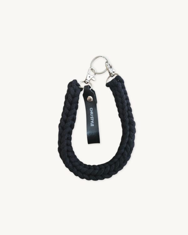 Black vegan leather braided keychain with dual metal clasps and CHIU STYLE logo tag