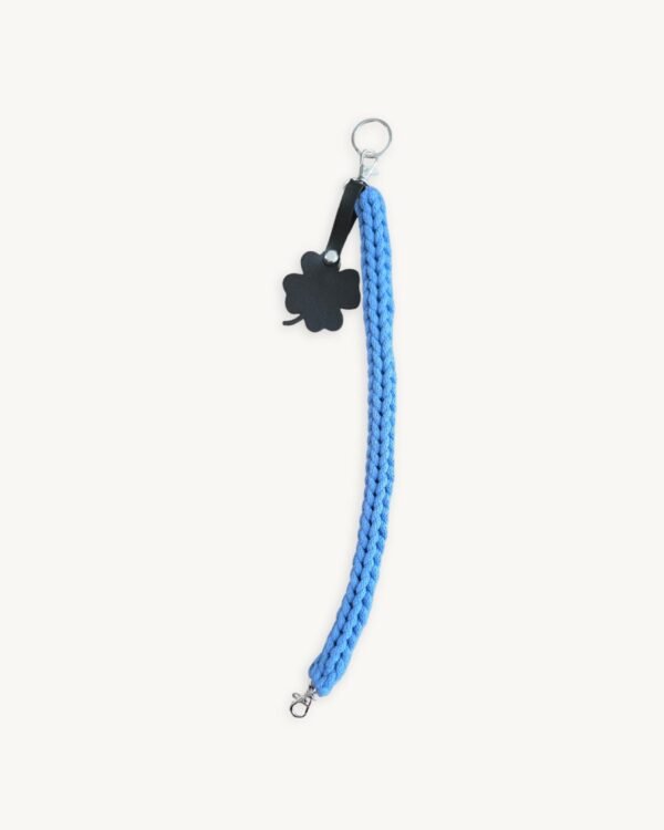 Full length straight view of the 36-38cm CHIU STYLE clover vegan leather braided keychain in cornflower blue, highlighting its complete structure and clover tag
