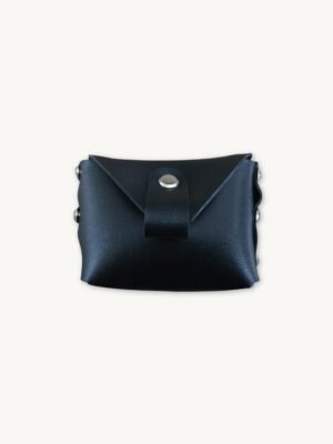 Black minimalist vegan leather micro wallet front view showing raw edges and two Chicago screws securing the industrial design.