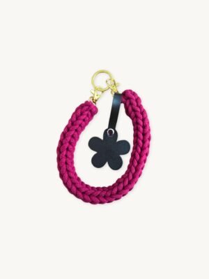 Front view of the CHIU STYLE floral vegan leather braided keychain in Sangria, featuring a burnt umber die-cut flower tag and polished metal clasps