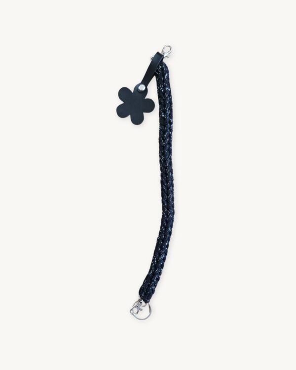Full length straight view of the 36-38cm CHIU STYLE floral vegan leather braided keychain in Black with Silver Thread, highlighting its complete structure and flower tag