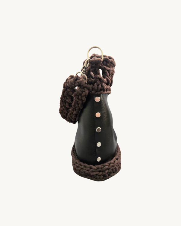 Side view of Vintage Punk Vegan Leather Lattice Weave Handbag in dark brown showcasing Chicago screw hardware and textured profile
