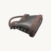 Dark Brown Vintage Punk Vegan Leather Classic Handbag resting sideways on a table showing the structured bottom view