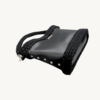 Black Vintage Punk Vegan Leather Classic Handbag resting sideways on a table showing the structured bottom view