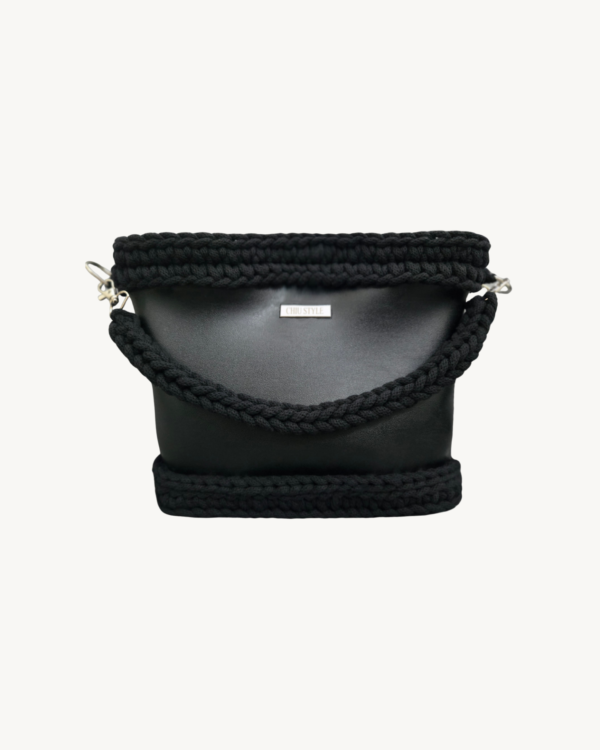 Black Vintage Punk Vegan Leather Classic Handbag front view with braided handle naturally resting on the front bag body